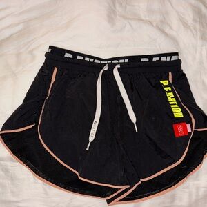 P.E Nation Riochet short in Black and red. Never worn. Size XS